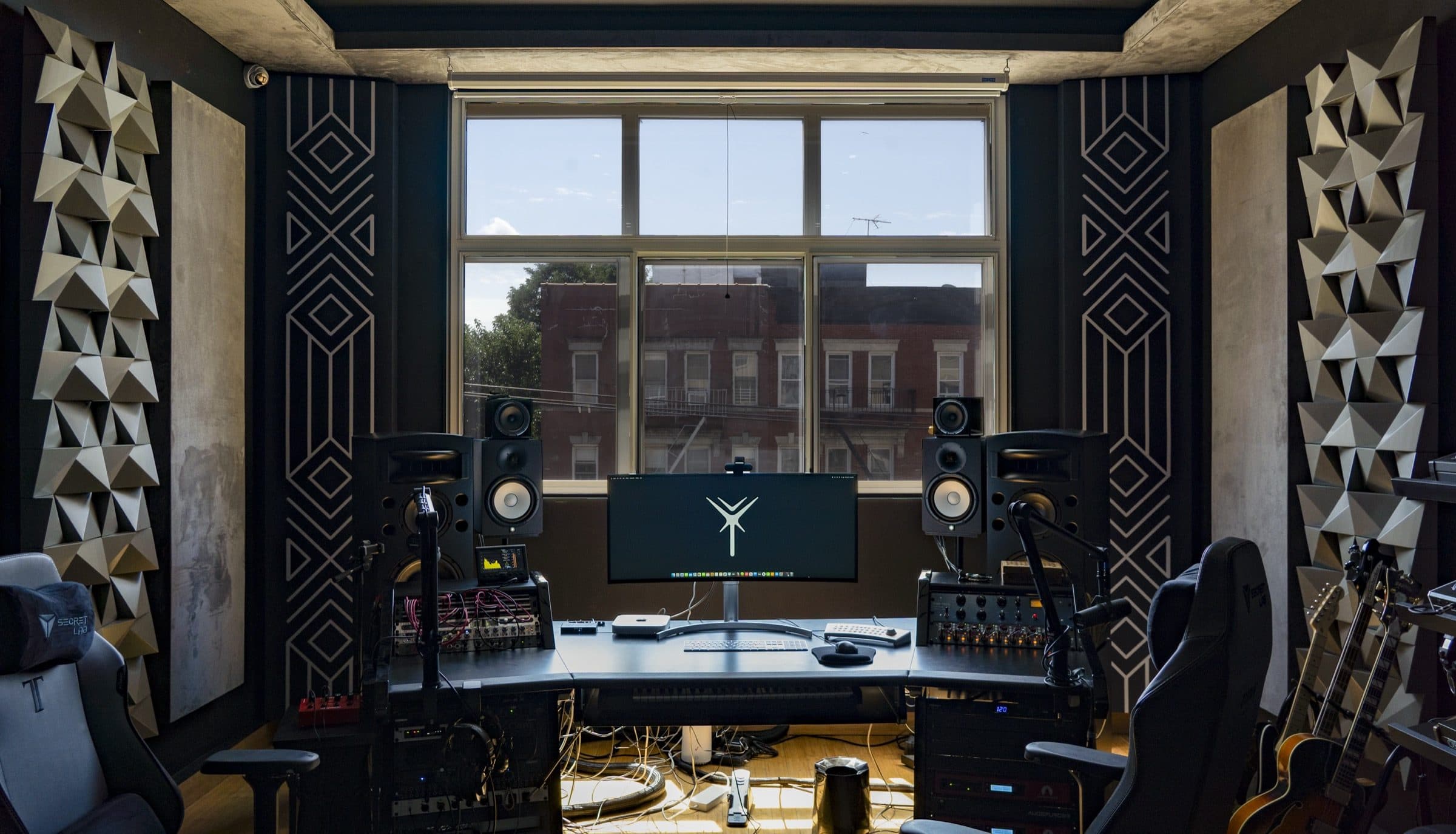 Main control room at Antenna Studios with Augspurger monitors and ultrawide display